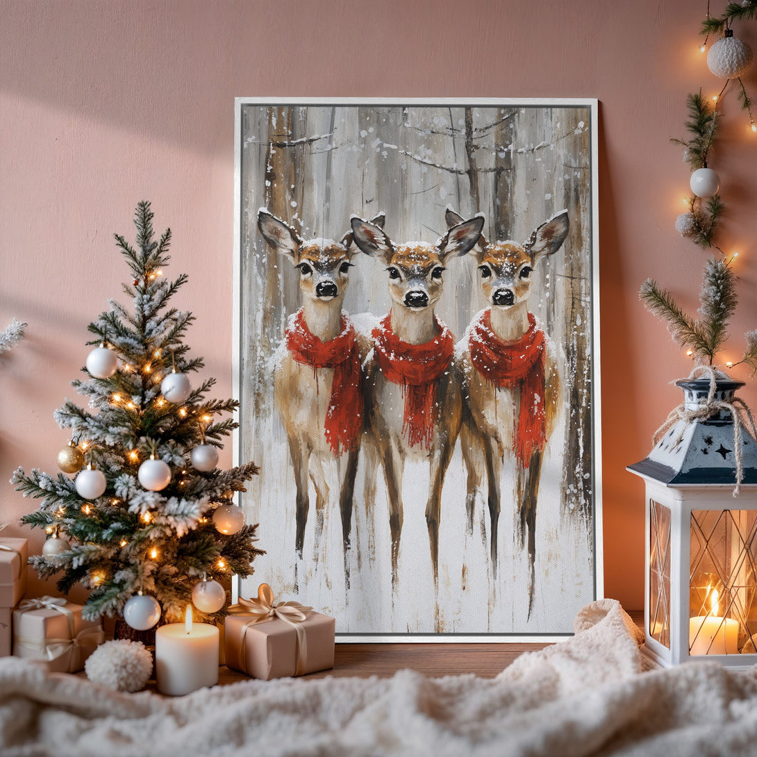 Framed Wall Art: Winter scene with deer in red scarves. Neutral and red palette, perfect for holiday decor. Shop Canvas Prints for cozy home accents!