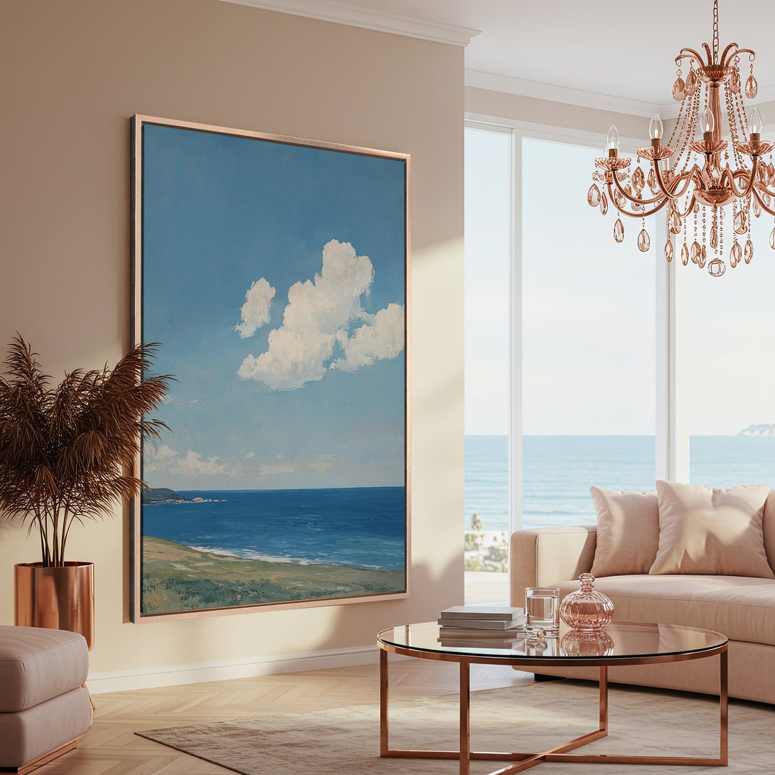 Framed Wall Art: Serene ocean landscape Canvas Print in a modern living room. Blue, beige, and copper tones create a calming, stylish interior.