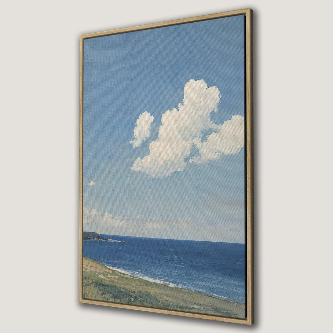 Framed Wall Art: Coastal landscape painting with blue sky, white clouds, and sea. Serene, impressionistic style with a cool, calming color palette.