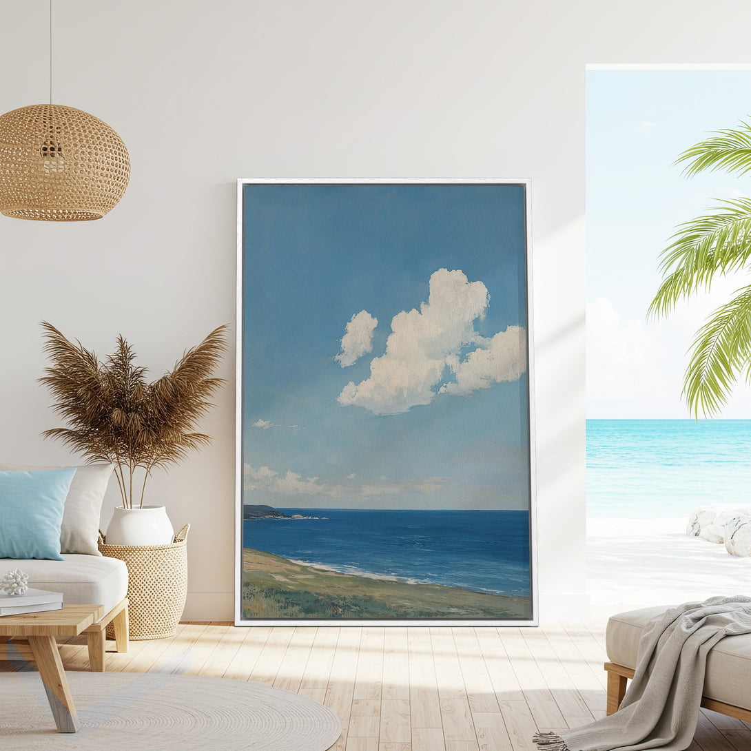 Framed Wall Art featuring a serene seascape painting in blue and white hues. Coastal style canvas print perfect for adding a calming touch to your home decor.
