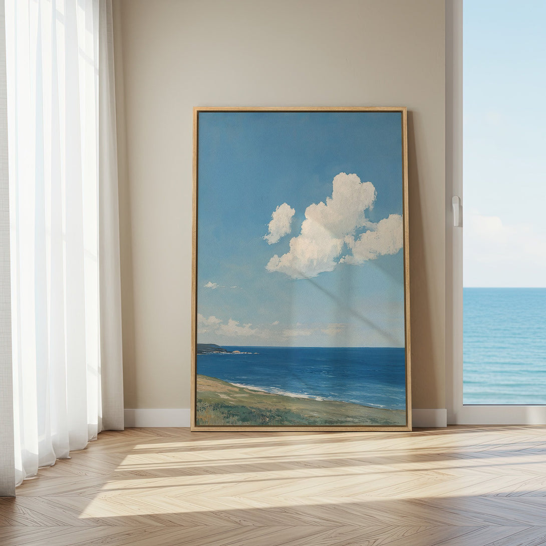 Framed Wall Art: Serene seascape Canvas Print in blue and white, perfect for coastal decor. Adds a touch of calm to any space.