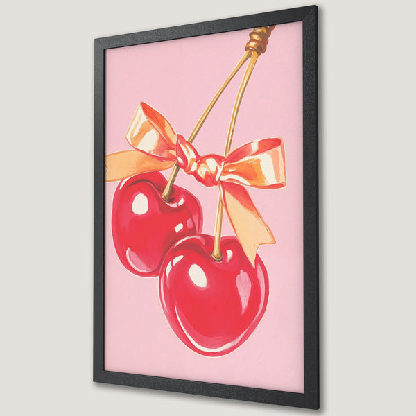 Framed Poster featuring watercolor cherries with a pink background. A stylish and colorful art print for your home decor.