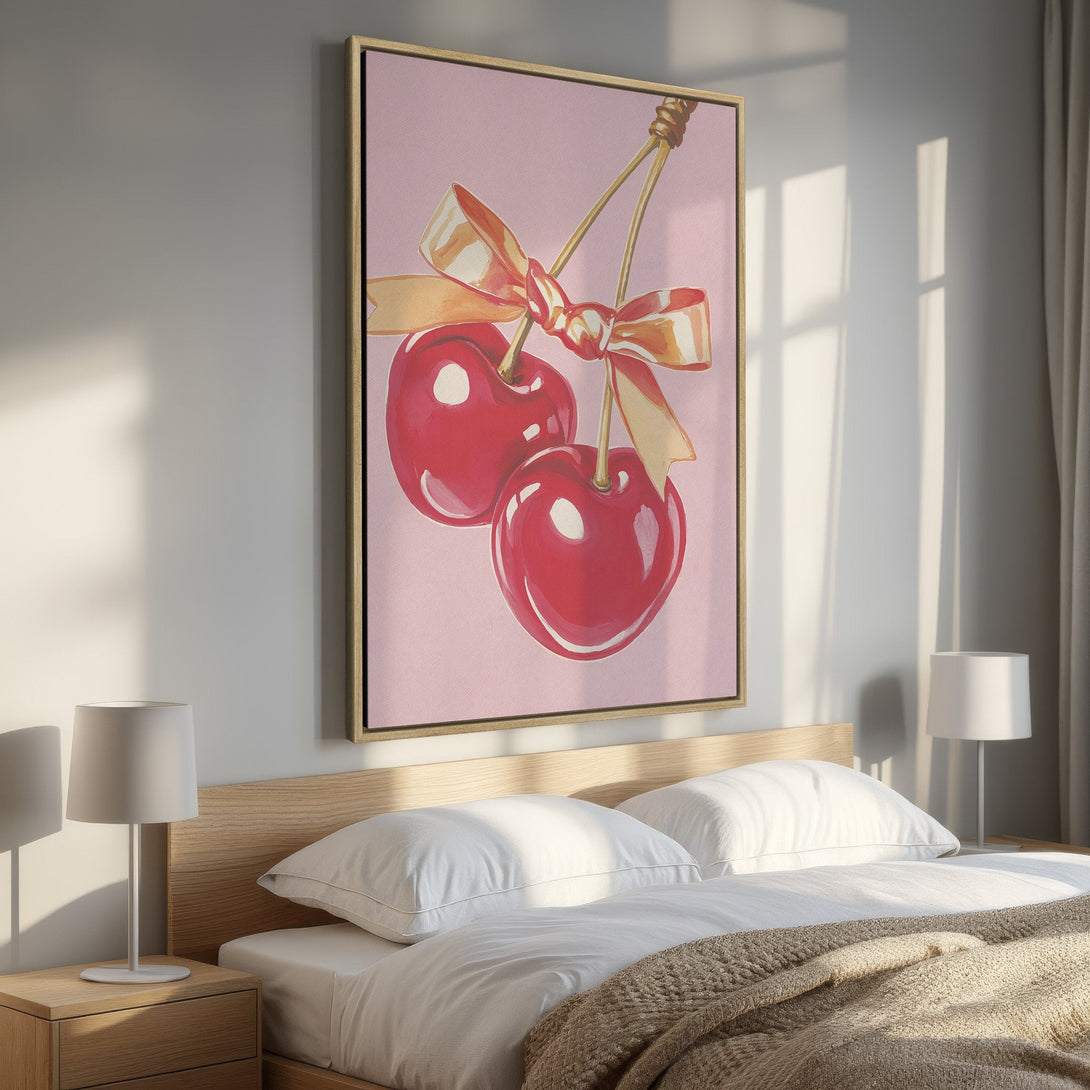Framed Wall Art: Watercolor cherries with gold ribbon on pink background. Perfect bedroom decor! Adds a pop of color to any space.