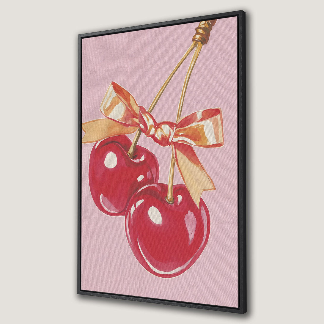 Framed Wall Art: Watercolor cherries with a gold bow on a pink background. Perfect for adding a pop of color and charm to your home decor.