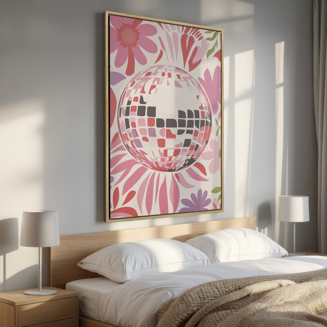 Framed Wall Art featuring a retro disco ball design with floral accents. Pink and purple palette adds a pop of color to any bedroom. Modern wall decor.