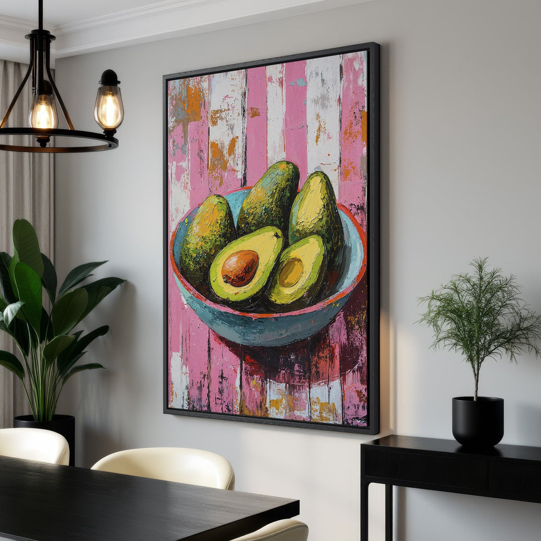 Framed Wall Art: Vibrant avocado painting with pink, green, and blue palette. Modern abstract style, perfect for kitchen or dining room decor. Buy art online!