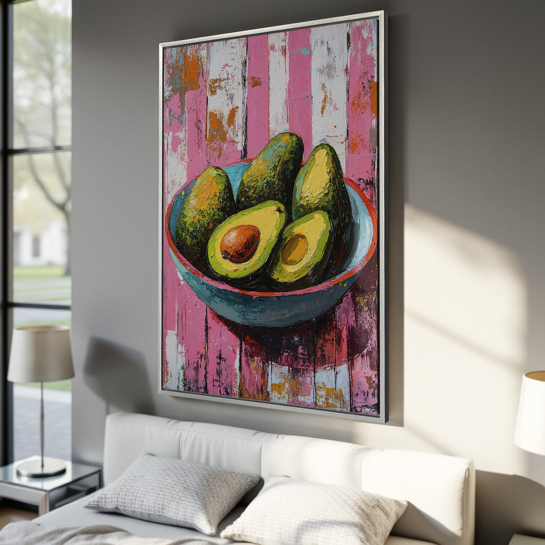 Framed Wall Art: Vibrant avocado still life in an impressionistic style with pink, green, and blue tones. Perfect for kitchen or dining room decor.