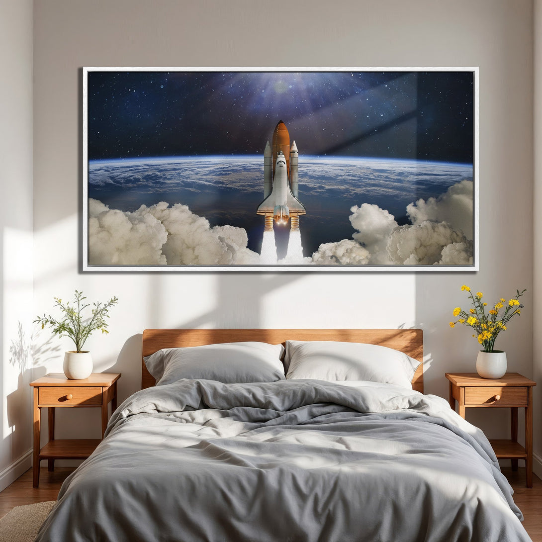 Framed Wall Art: Space shuttle launch canvas print in a bedroom. Dramatic space scene with blues, oranges, and whites. Modern decor for a bold statement.