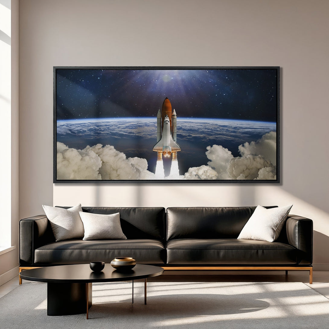 Framed Wall Art featuring a space shuttle launch, set against a starry sky and Earth. Dramatic, modern canvas print with a cool, neutral color palette.