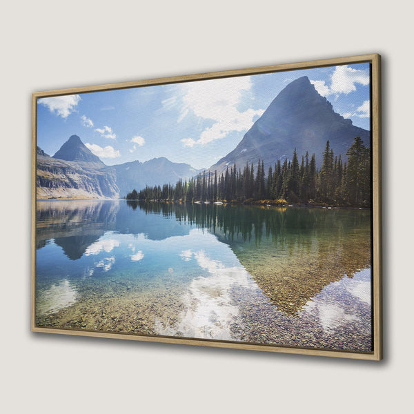 Canvas Print of serene mountain lake landscape. Earthy tones with blues, greens, and browns. Bring nature's beauty into your home with this Framed Wall Art.