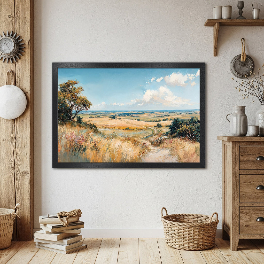 Framed Poster of a serene landscape painting, featuring a blue sky, golden fields, and a warm color palette. Perfect wall art.