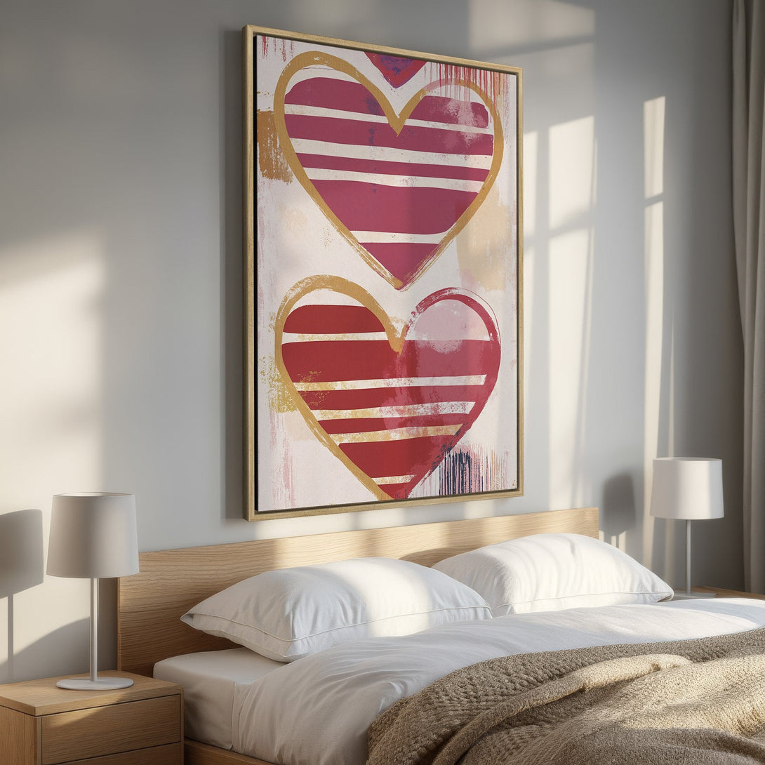 Framed Wall Art featuring abstract red hearts with gold accents. Modern art in a bedroom setting. Perfect for adding a pop of color and love!