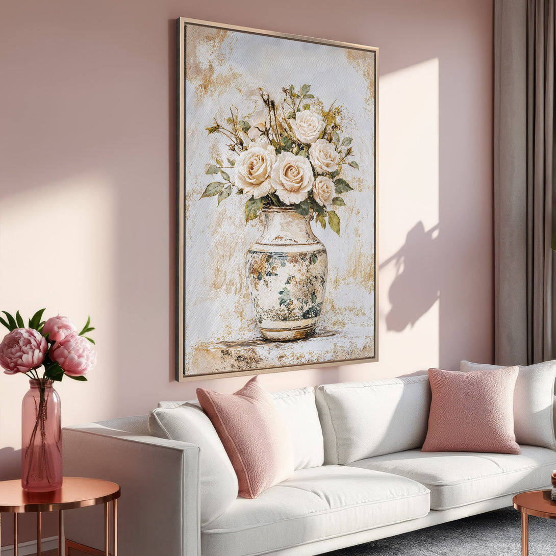 Framed Wall Art featuring a floral still life in soft cream and gold tones. Perfect for adding elegance and warmth to any living room.