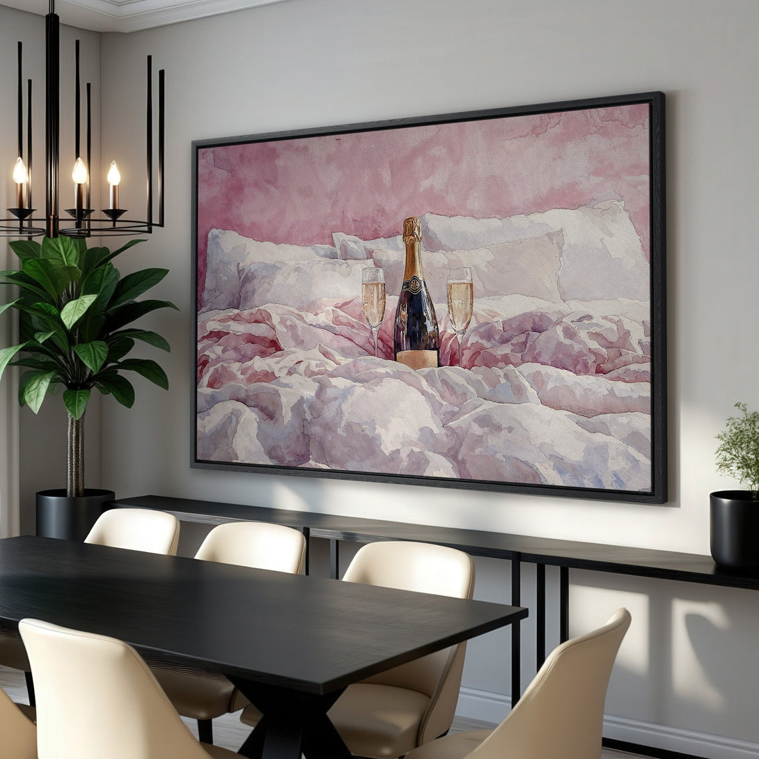 Framed Wall Art featuring a champagne bottle and glasses on a bed, watercolor style, in a soft pink and white color palette. Perfect for bedroom decor.