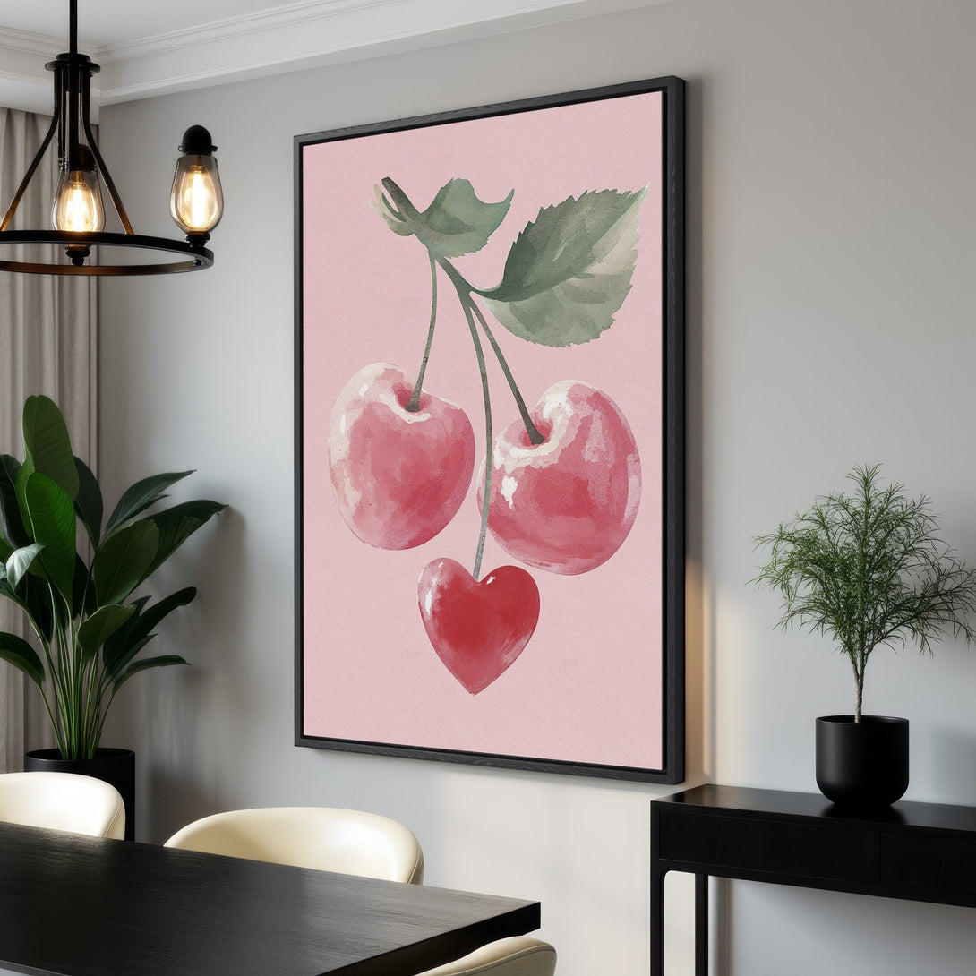 Framed Wall Art: Watercolor cherries on pink background. Modern farmhouse style canvas print in a dining room. Soft pink and red color palette.