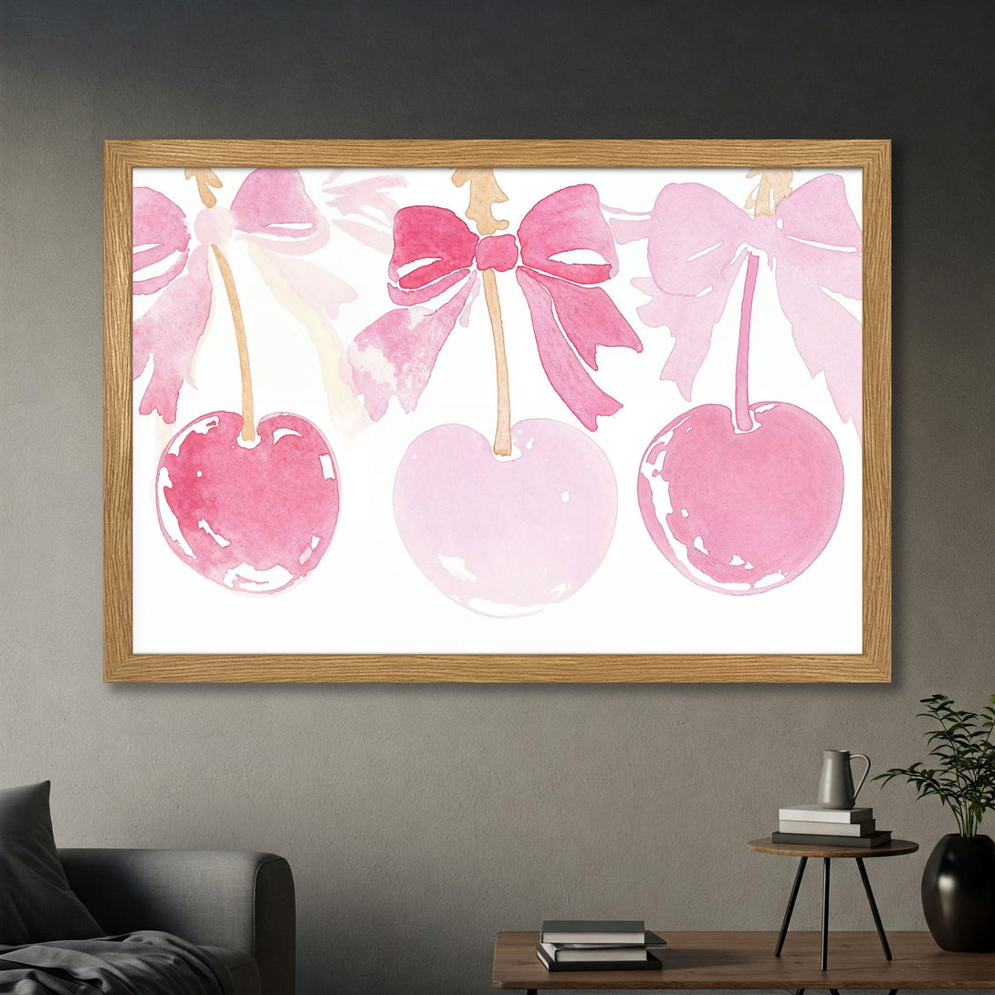 Framed Poster featuring watercolor cherries with pink bows. Perfect wall art in a soft pink color palette. Shop the Poster now!