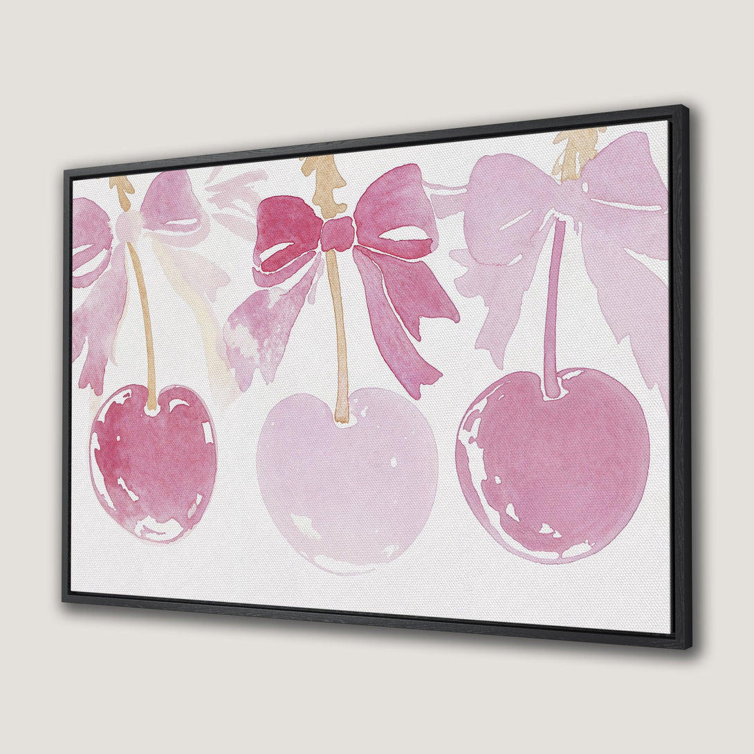 Framed Wall Art featuring watercolor cherries in pink hues. Add a touch of sweetness and elegance to your space with this beautiful canvas print.