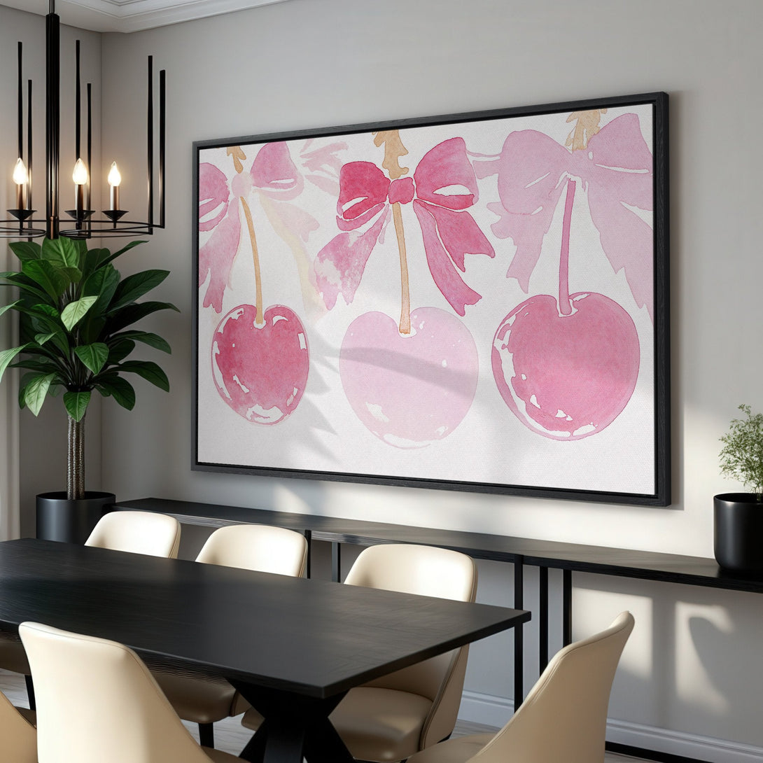 Framed Wall Art featuring watercolor cherries and bows in a pink and white palette. Perfect for adding a touch of whimsy to your dining room!
