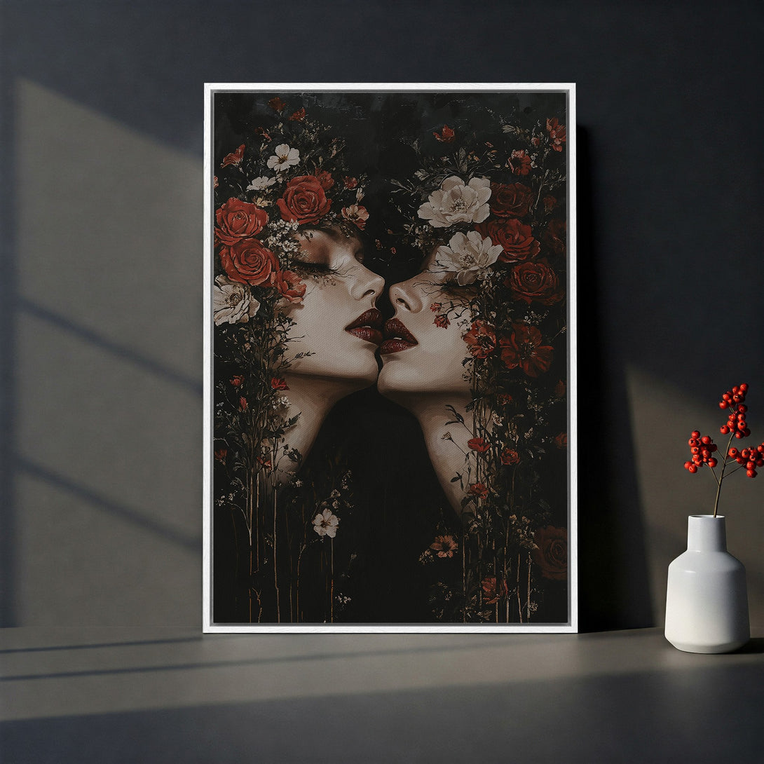 Framed Wall Art: Dramatic black & white portrait of two women with red floral accents. Modern canvas print for a bold statement.
