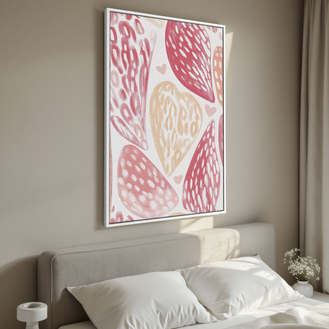 Framed Wall Art featuring abstract hearts in a blush and peach color palette. Modern art for bedroom decor.