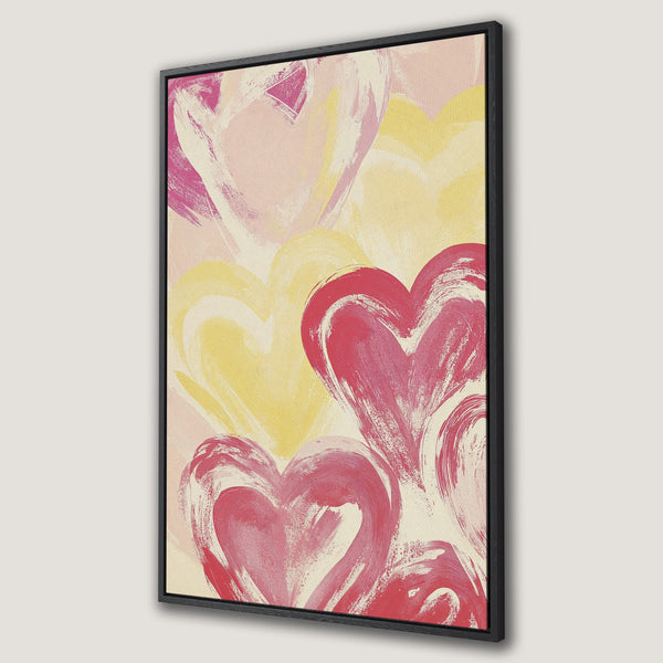 Framed Wall Art featuring abstract hearts in pink and yellow hues. Modern, expressive artwork for a stylish home.