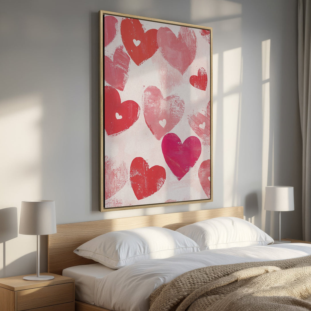Framed Wall Art: Abstract heart painting in red and pink hues. Modern bedroom decor featuring a canvas print with a romantic, artistic style.