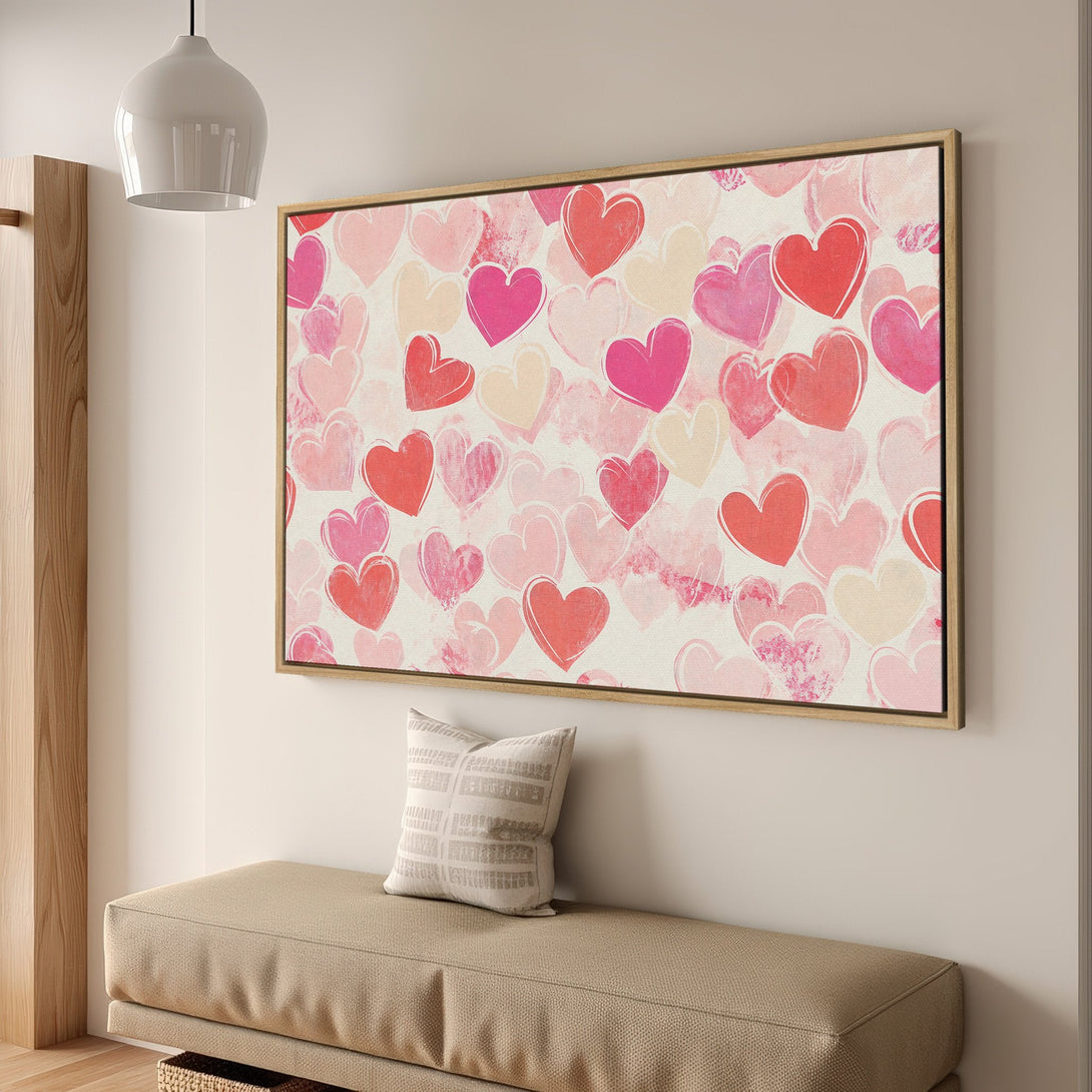 Framed Wall Art featuring a romantic heart pattern in pink, red, and cream hues. Perfect for adding a touch of love to your home decor.