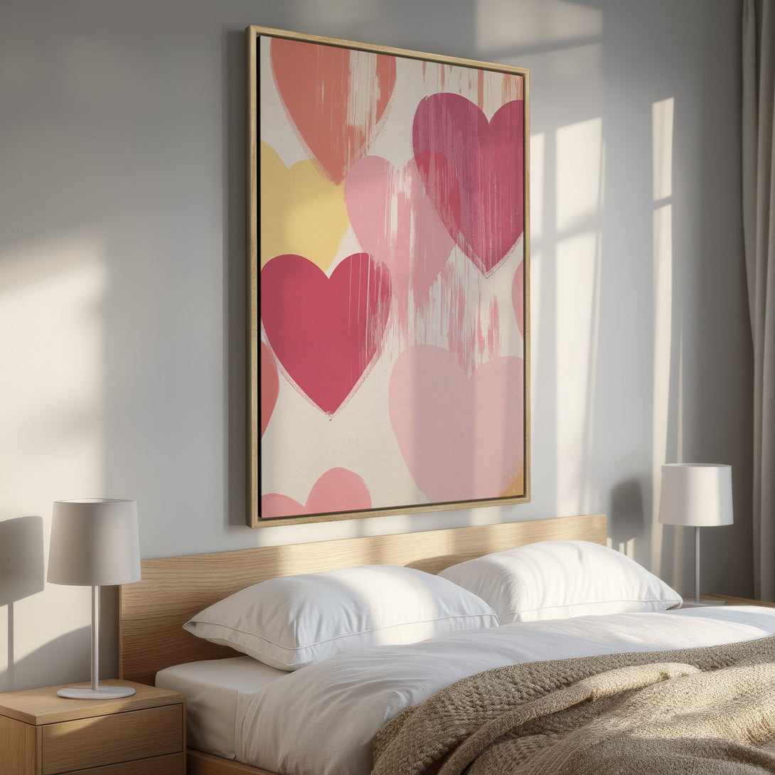 Framed Wall Art featuring abstract hearts in a warm pink and yellow color palette. Perfect for adding a touch of love to your bedroom decor.