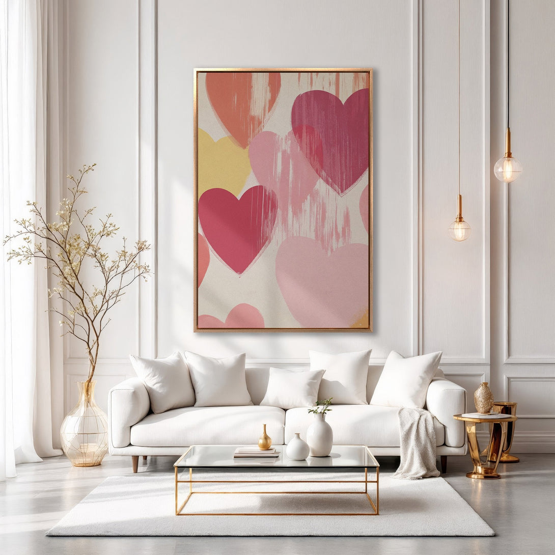 Framed Wall Art featuring abstract hearts in a warm pink and peach palette. Perfect for adding a touch of love and modern style to your home decor.