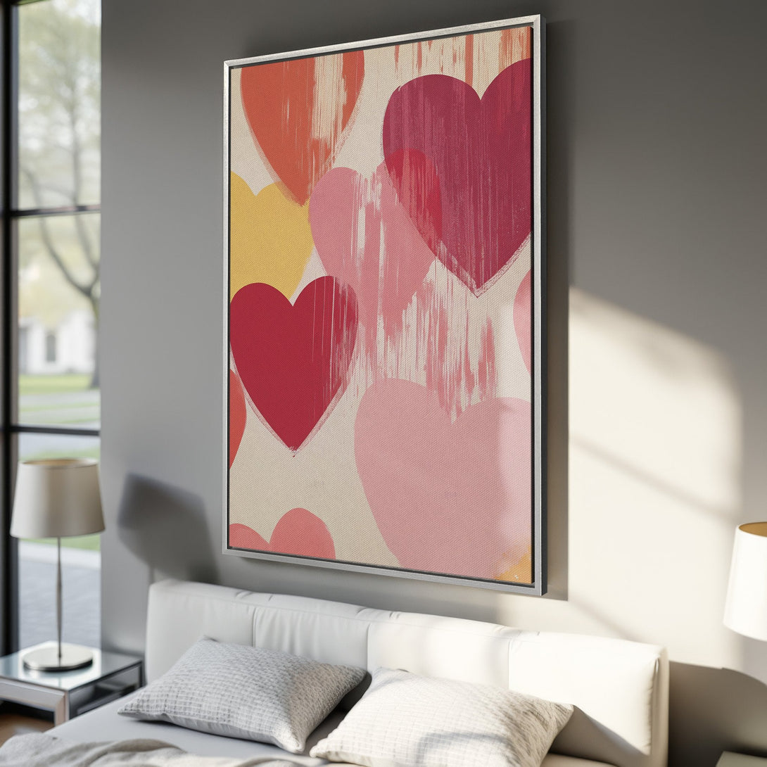 Framed Wall Art featuring a vibrant heart design in shades of red, pink, and yellow. Modern, abstract style, perfect for adding love and warmth to any space.
