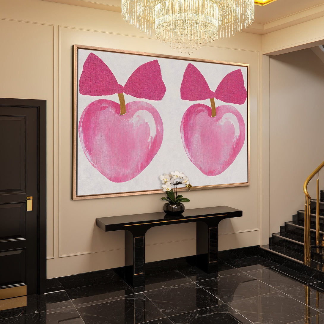 Framed Wall Art featuring pink heart art with bows. Modern style, vibrant pink and gold color palette, perfect for adding a pop of color to any space.