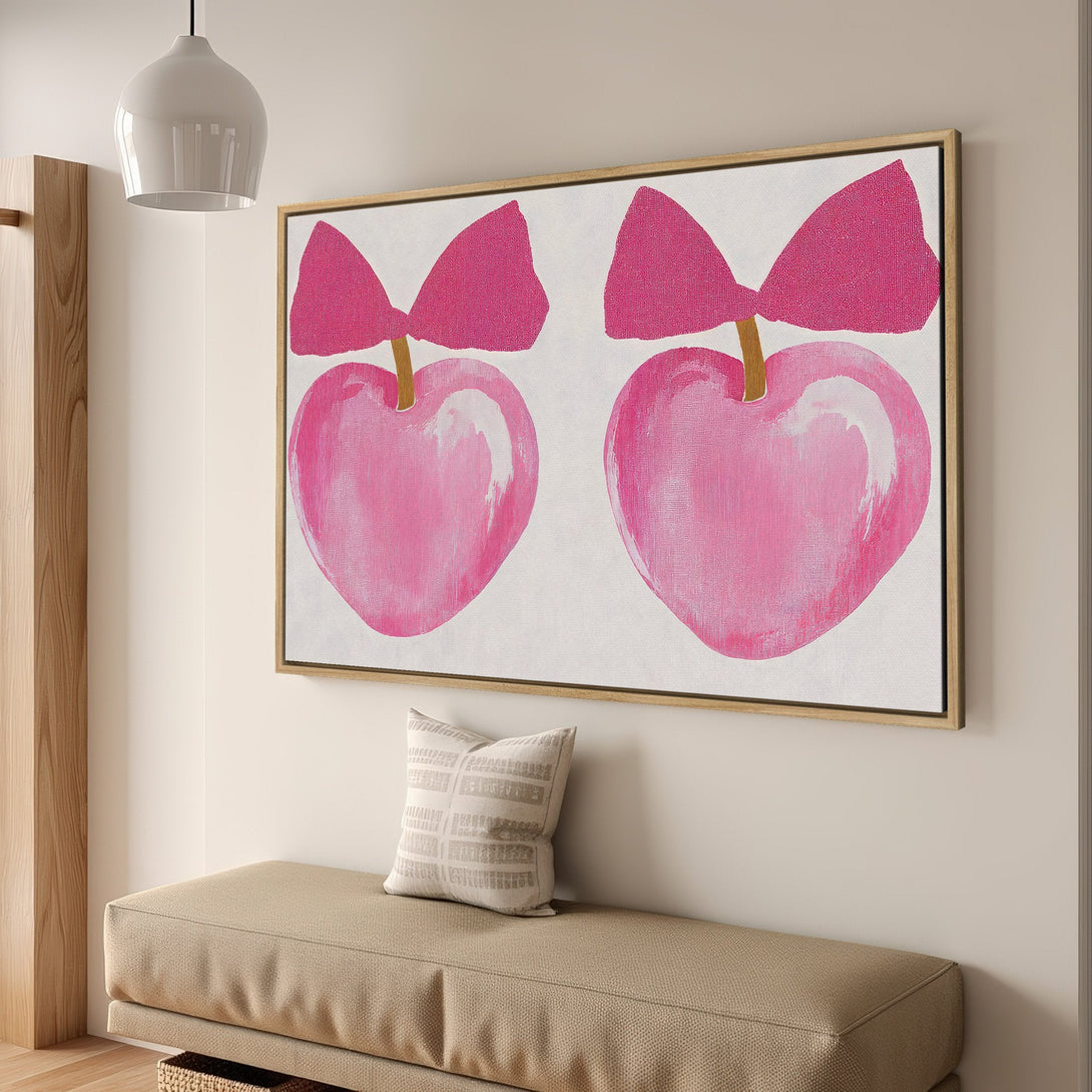 Framed Wall Art featuring pink heart art with bows. Modern, abstract style, perfect for adding a pop of color to any space.