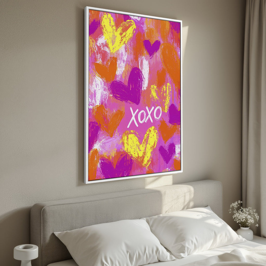 Framed Wall Art featuring abstract hearts in vibrant pink, orange, and yellow. Modern art perfect for bedroom decor. Add a pop of color to your space!