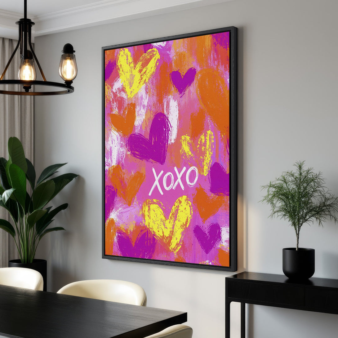 Framed Wall Art featuring a vibrant, abstract heart design in pink, orange, and yellow. Modern art for a pop of color in your home!