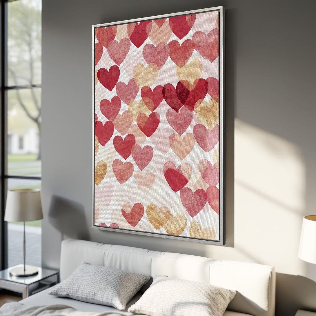 Framed Wall Art featuring a heart pattern in red, pink, and gold hues. Perfect for adding a touch of love and warmth to your bedroom decor.