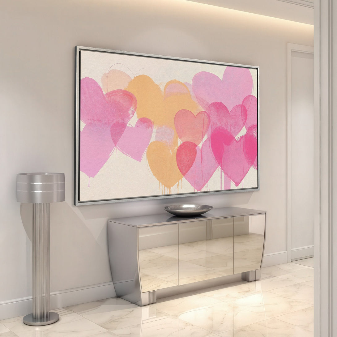 Framed Wall Art featuring abstract pink and peach hearts. Modern art print adds a pop of color to any interior. Shop our Canvas Print collection today!