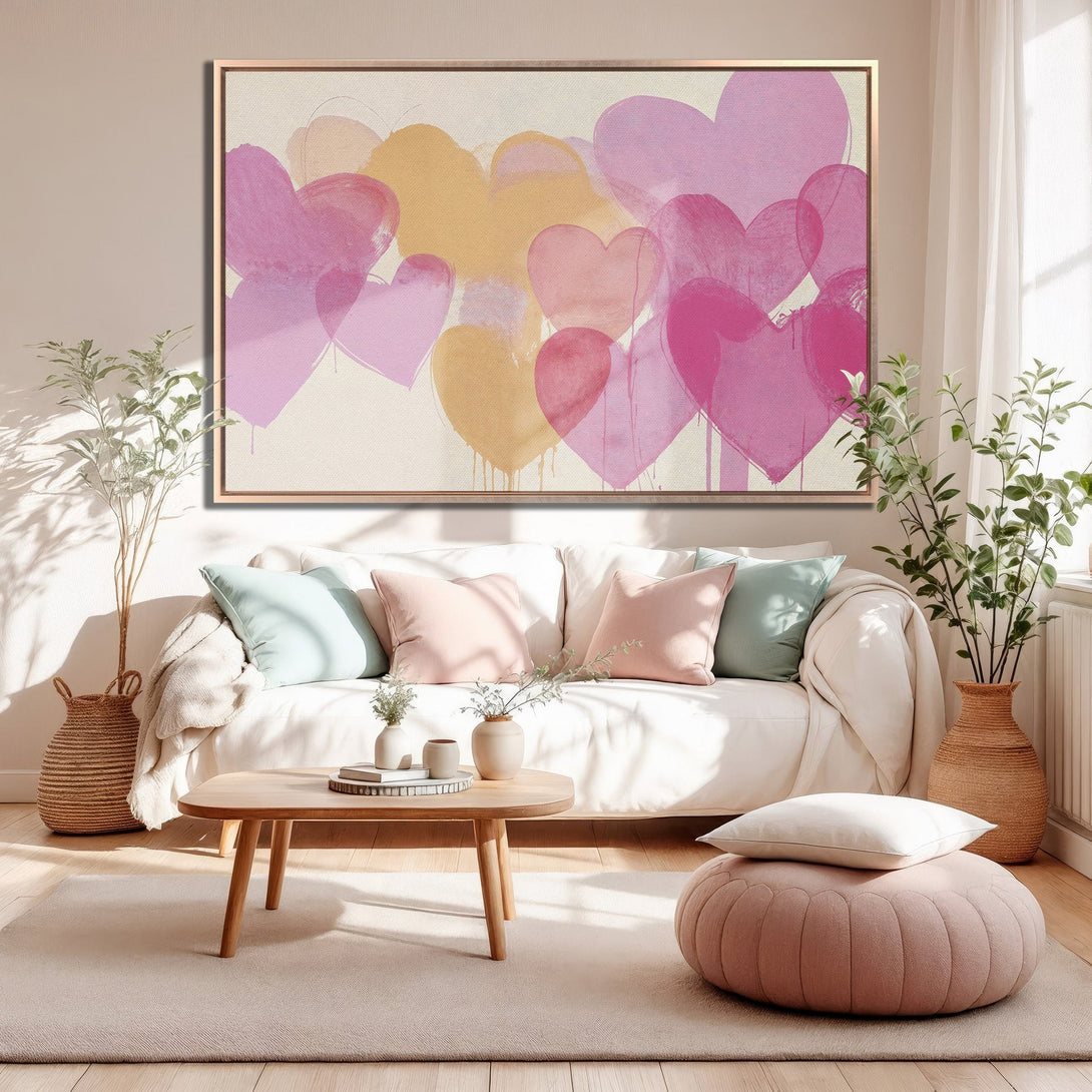 Framed Wall Art featuring abstract hearts in pink and peach tones. Modern art for a stylish living room, adding a pop of color and love.
