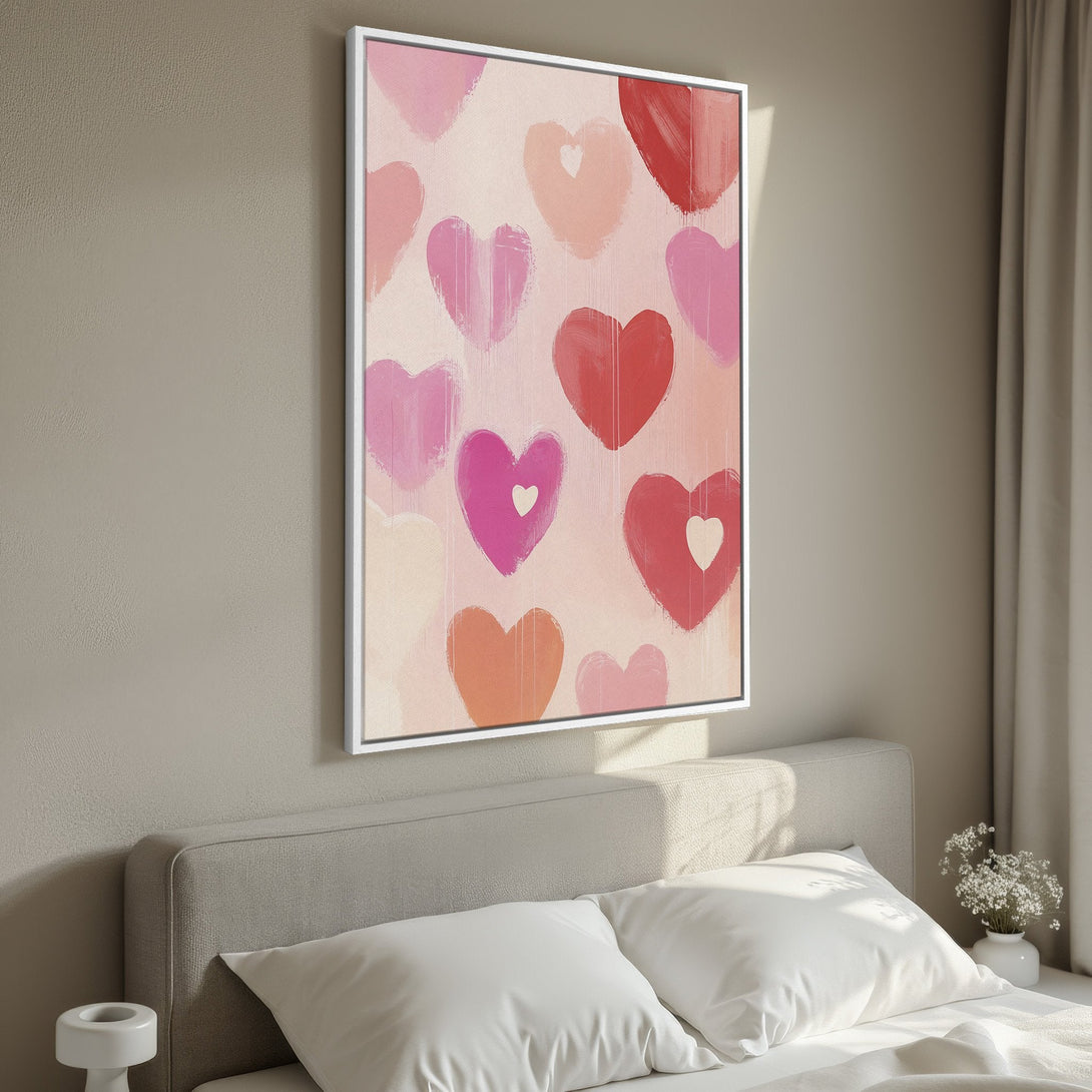 Framed Wall Art featuring a modern, abstract heart design in a warm pink and red color palette, perfect for adding love to your home decor.