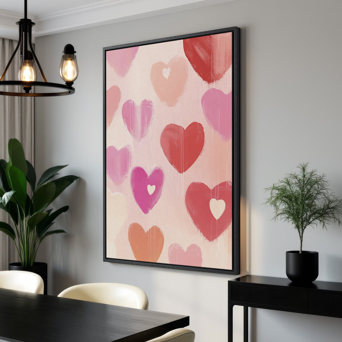 Framed Wall Art featuring abstract hearts in pink and red hues. Modern canvas print perfect for adding a touch of love and style to any room.