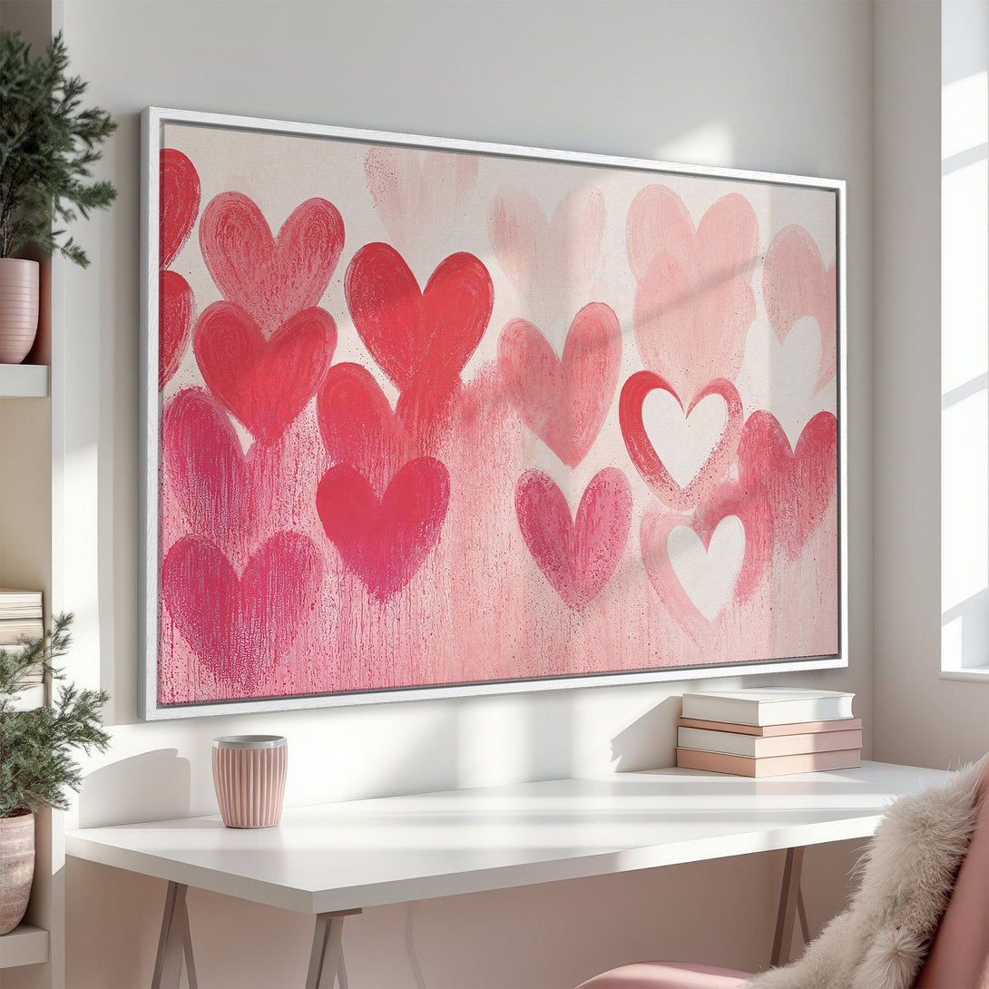 Framed Wall Art featuring a romantic heart design in shades of pink and red, perfect for adding a touch of love to any space.