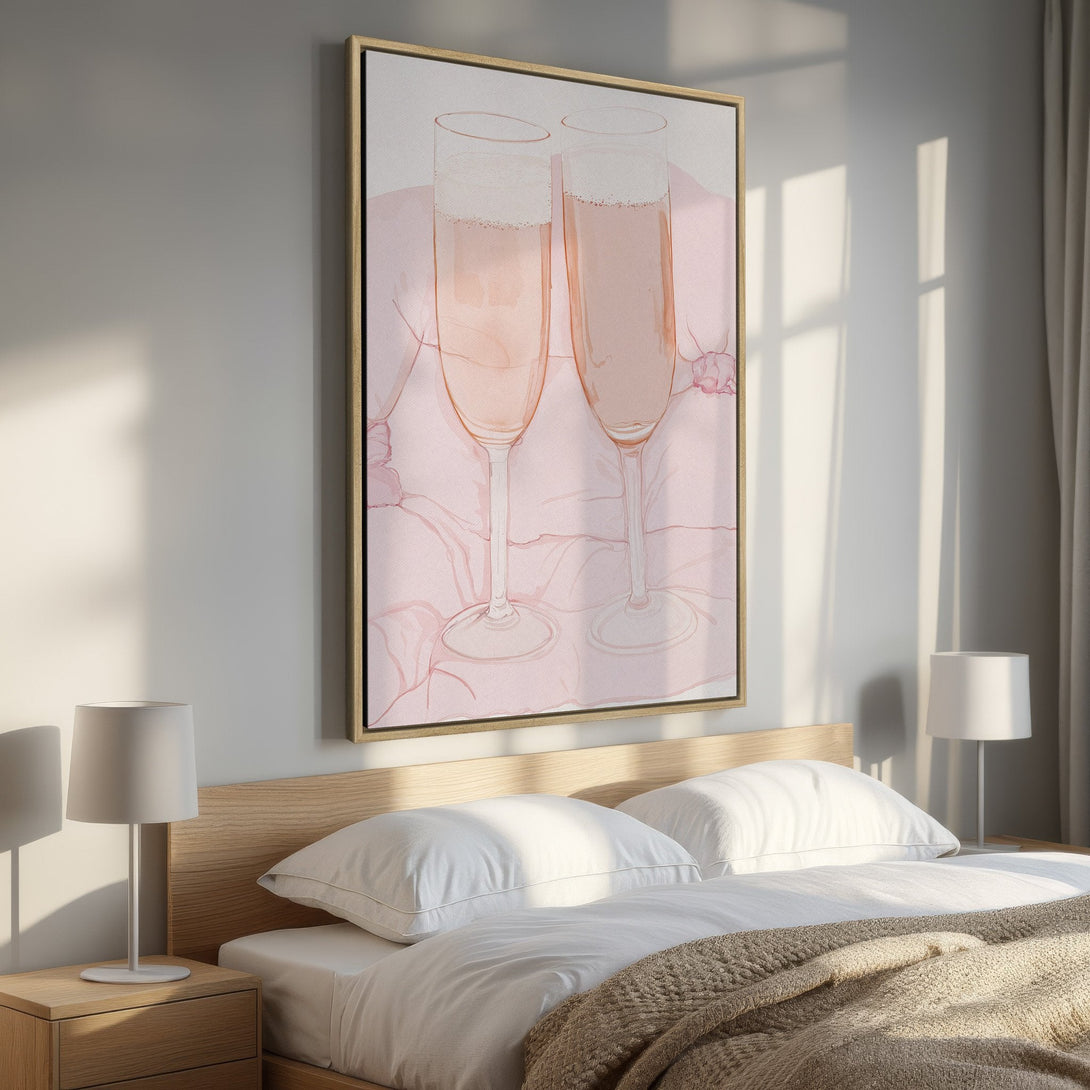 Framed Wall Art featuring champagne glasses in a soft pink watercolor style. Perfect for bedroom decor, this print adds a touch of elegance with its blush tones.