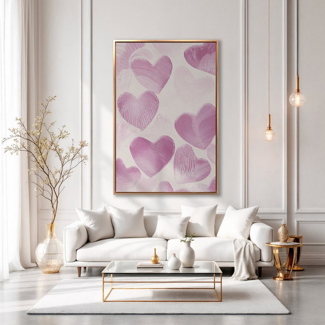 Framed Wall Art featuring abstract pink hearts, displayed in a modern, minimalist living room with a soft, neutral color palette. Perfect for adding love and style!
