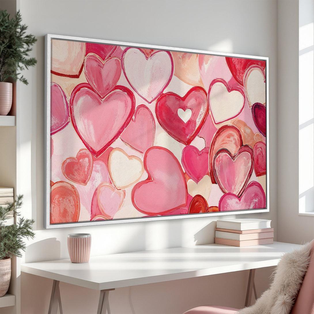 Framed Wall Art featuring a romantic heart design in shades of pink and red, perfect for adding a touch of love to your home decor.