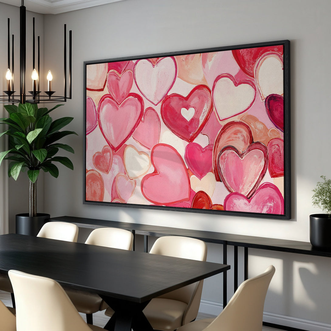 Framed Wall Art featuring a vibrant, abstract heart design in shades of pink and red. Perfect for adding a touch of love and modern style to any space!