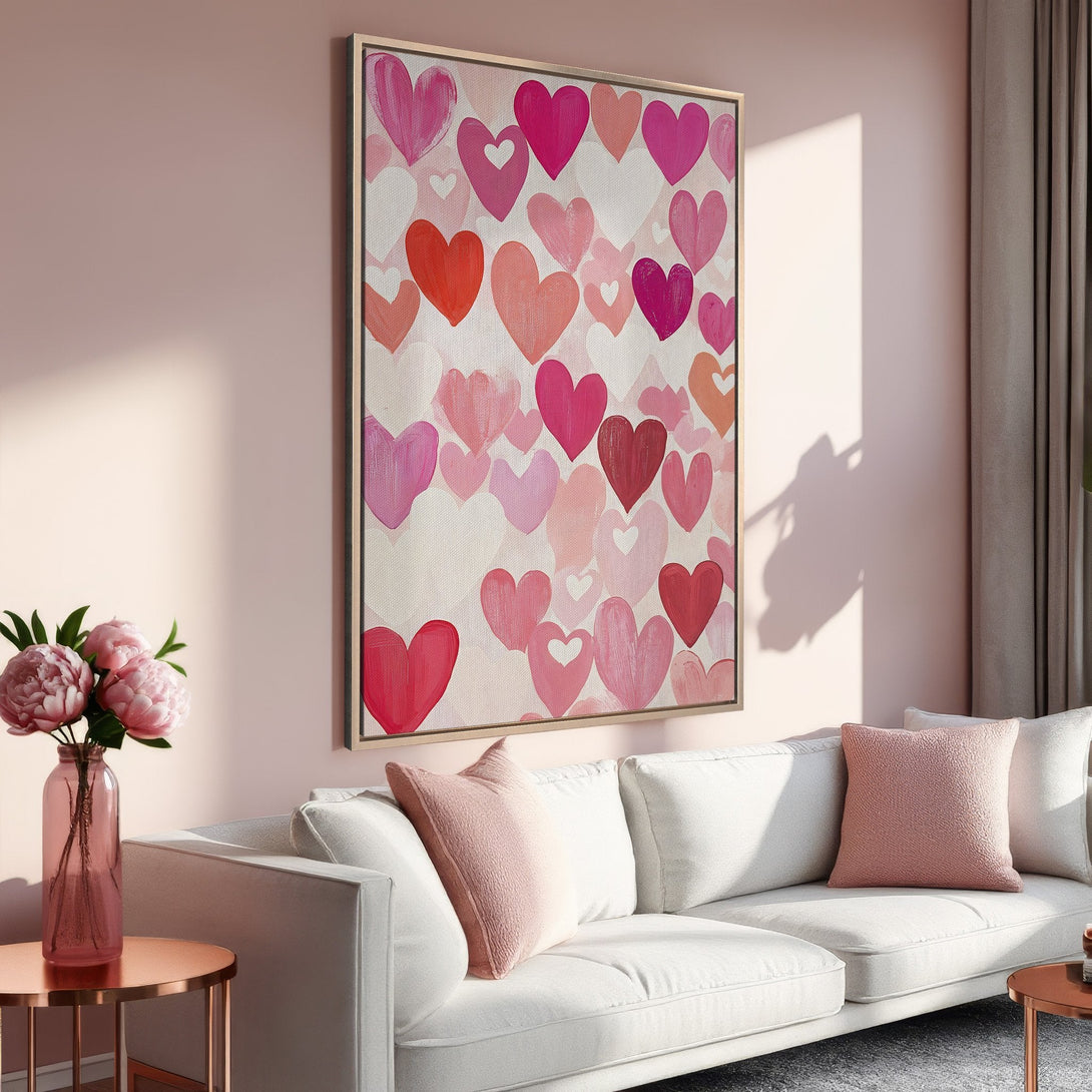 Framed Wall Art featuring a heart-filled design in shades of pink and red. Modern art style adds a touch of love to any interior space.