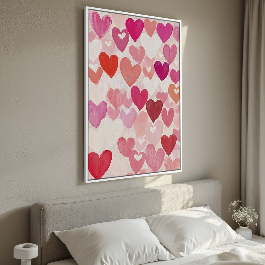 Framed Wall Art featuring a vibrant pattern of hearts in shades of pink and red, perfect for adding a touch of love to any room.
