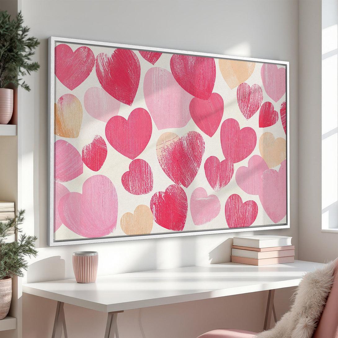 Framed Wall Art featuring a vibrant heart pattern in shades of pink and peach. Perfect for adding a touch of love to any space.