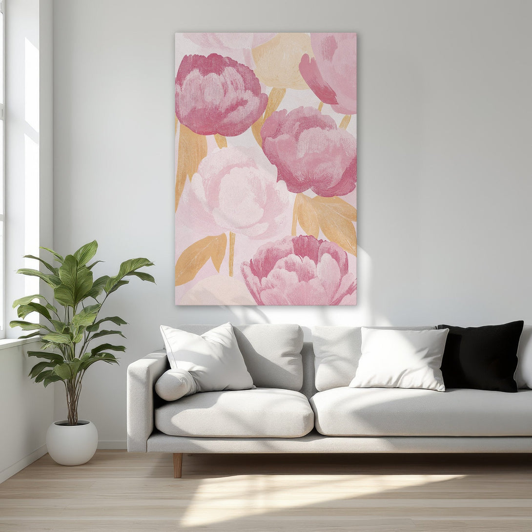 Framed Wall Art featuring pink floral art in a bedroom. Modern style canvas print with a soft pink and gold color palette. Elevate your space!