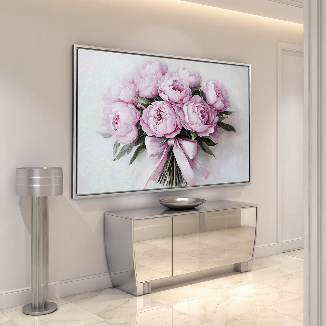 Framed Wall Art featuring a bouquet of pink peonies. Elegant floral art in a soft, pastel color palette. Perfect for adding a touch of beauty to any space.