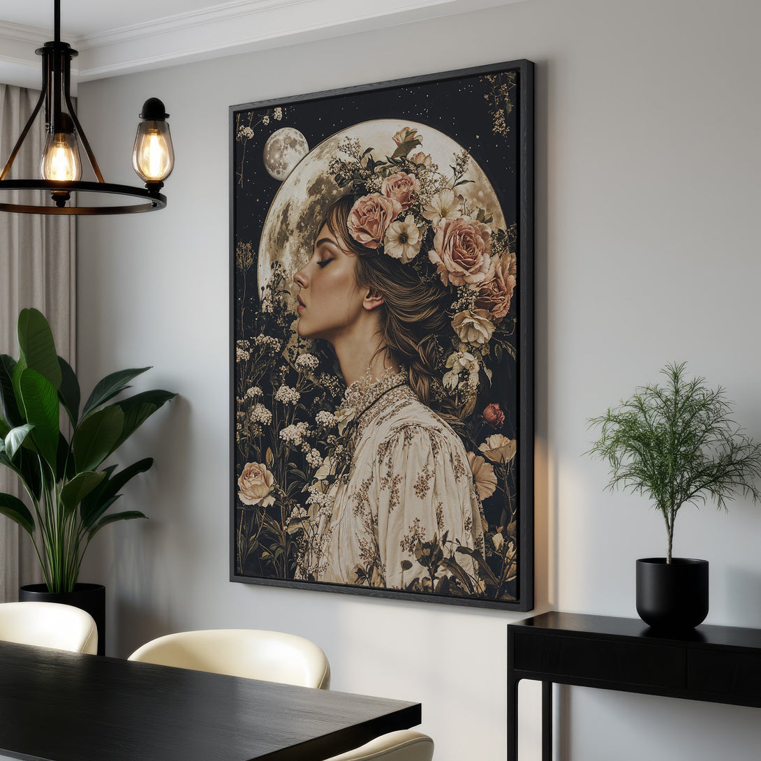 Framed Wall Art featuring a woman with flowers, moon, and floral elements. Vintage style with a warm, neutral color palette. Perfect for adding elegance to any space.